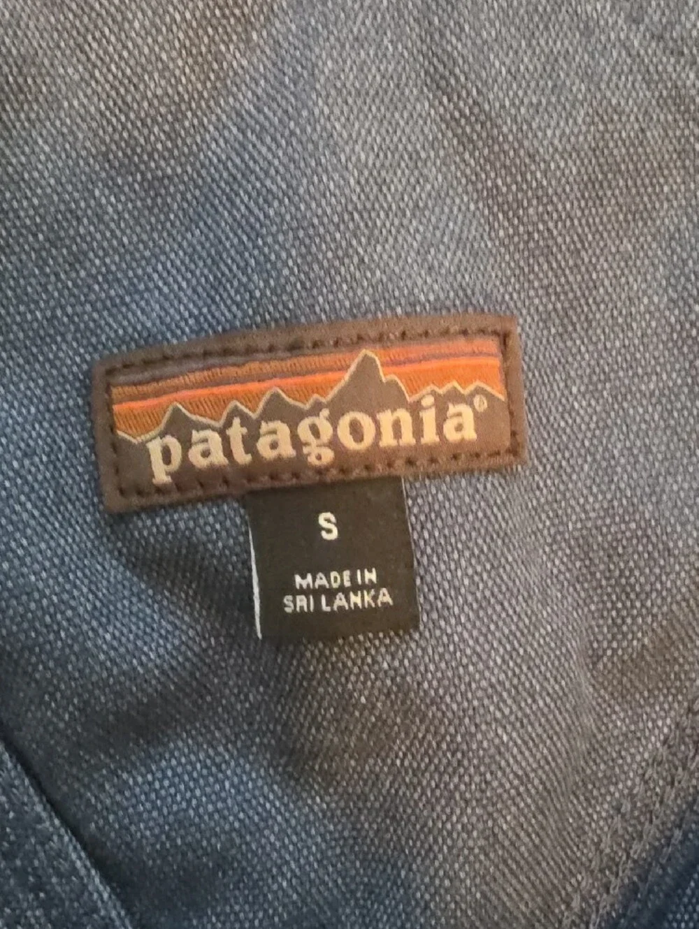 Patagonia Blue Jacket with Brown Logo Patch